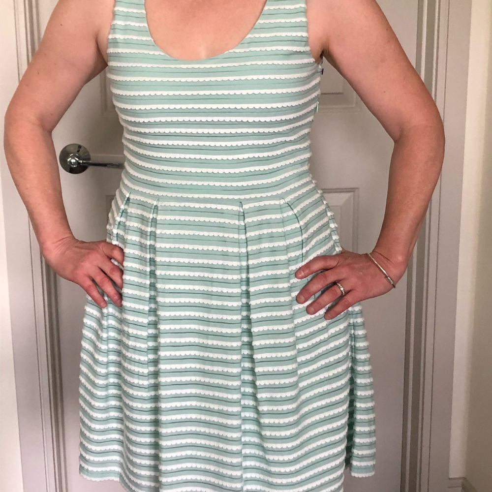 Mint/light green and white Althea dress. Hits above the knee.